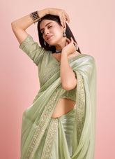 Pista colour saree looking smart